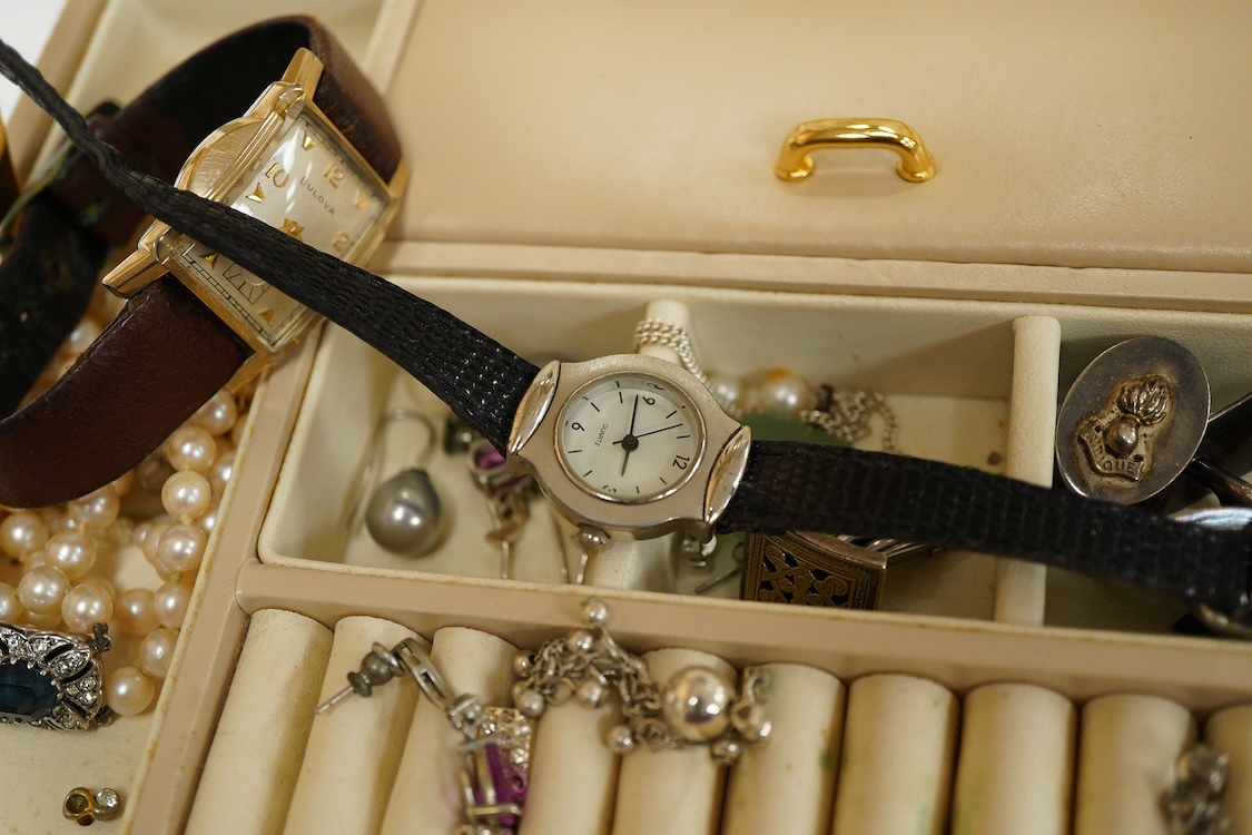 A jewellery box containing mainly costume and other jewellery including, silver and 925 cufflinks, a cultured pearl necklace with silver and paste set clasp and three wrist watches including a steel and gold plated Bulov